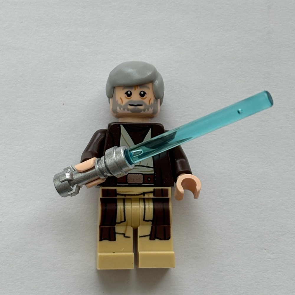 Lego Obi-Wan Kenobi minifigure with lightsaber